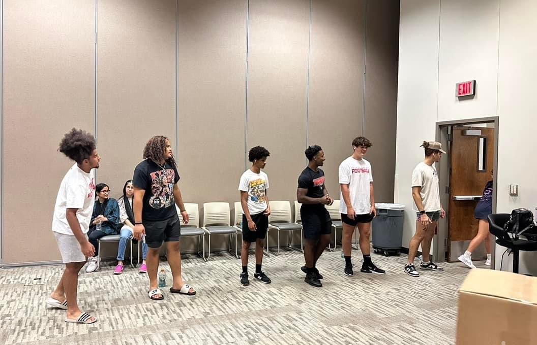 IAR2_Football's tweet photo. Thankful for the opportunity to serve on this Friday by giving back to the community! They helped unload boxes to prepare for tomorrow’s “Operation Back 2 School” hosted by our friends @6stones 
#TrojanDNA https://t.co/eMpKJQx35Q