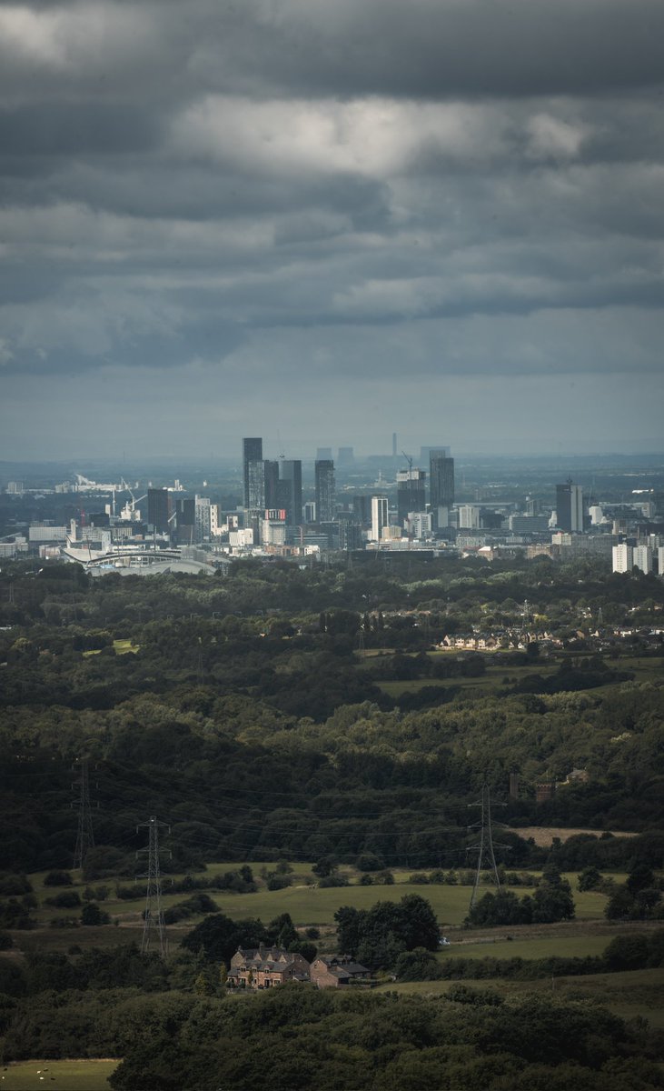 Vertical pano looking out from Hartshead Pike towards Manchester. Squint to see Fiddlers Ferry, the Mersey Gateway Bridge and a lone dog walker. #photography #ThePhotoHour #landscapephotography #manchester