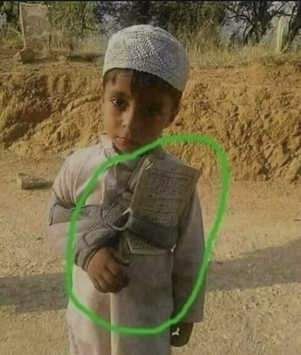 HalalNation_'s tweet photo. Injured child still holds Quran with him 🥀❤️ https://t.co/cYnihMmYjy