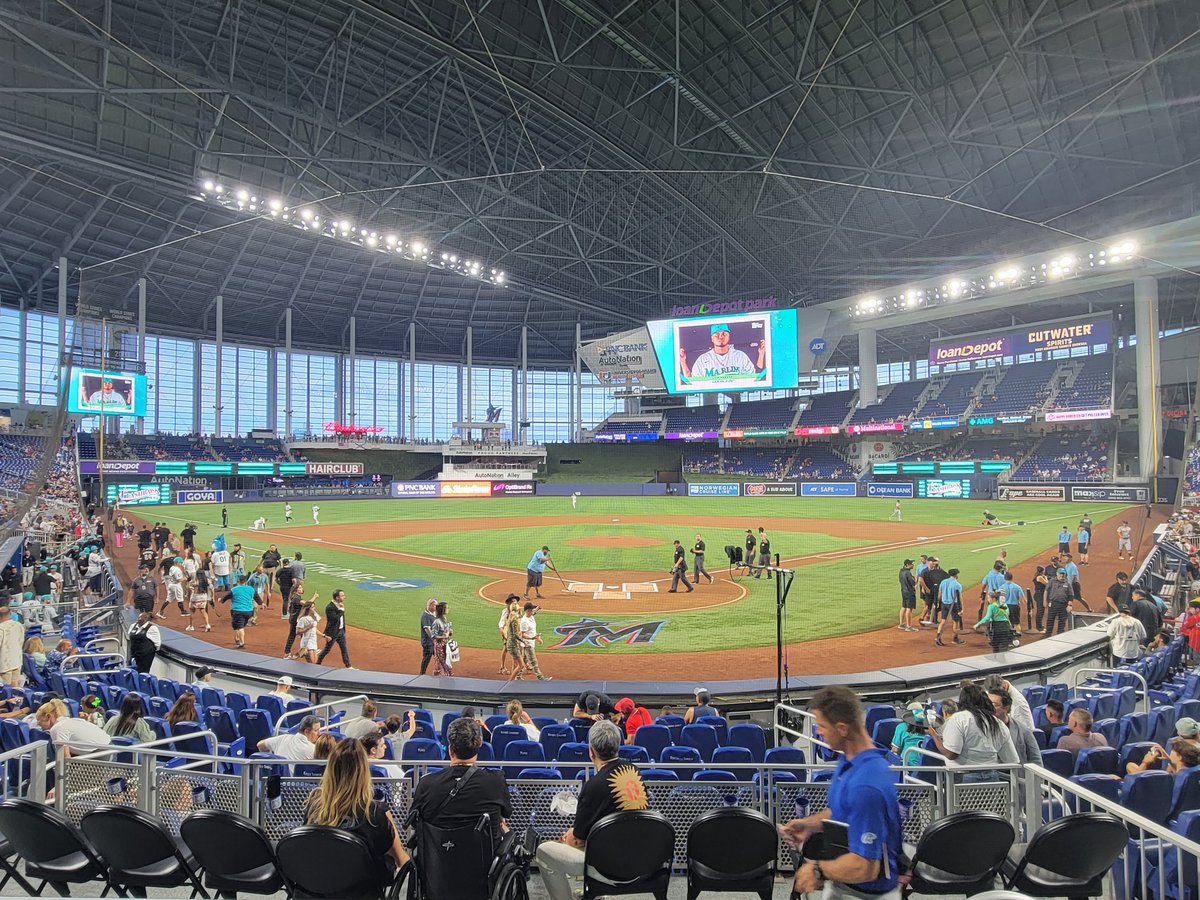 Coach_Purcell's tweet photo. When in Miami, we had to catch a Marlins game!! Marlins vs Tigers at LoanDepot Park!! This makes ballpark #13 for me and #5 for Brittany!! https://t.co/c2ul4UZXtA