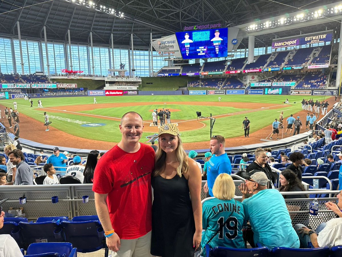 Coach_Purcell's tweet photo. When in Miami, we had to catch a Marlins game!! Marlins vs Tigers at LoanDepot Park!! This makes ballpark #13 for me and #5 for Brittany!! https://t.co/c2ul4UZXtA