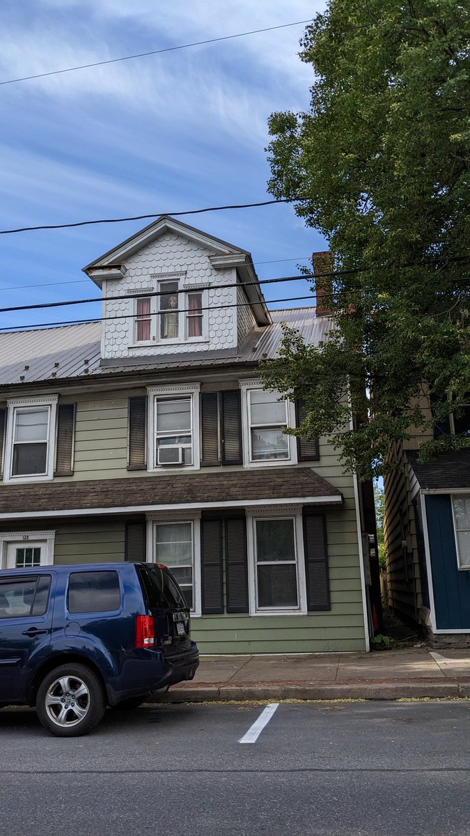 markperrymedia's tweet photo. I drive the same route to work every day for over a year and just this week noticed the spectator in the top window. https://t.co/CcNEPpvcXH