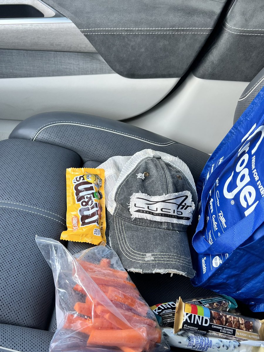 Tesla2Lucid's tweet photo. Got stuck in the office and finally on my way to #TeslaTakeOver2023! Didnโt get a chance to ๐๐ but itโs OK for the #LucidAir #RangeKing #FirstTo500 confirmed by the range ๐บ๏ธ. Got my snacks taken care of too! Look forward to meeting #LucidOwnersClub member @CoreSL22 & seeing the crew from @SoCalEVs & @FthePump1 as well as @TSportline @EvSportline & so many more #EVangelists!