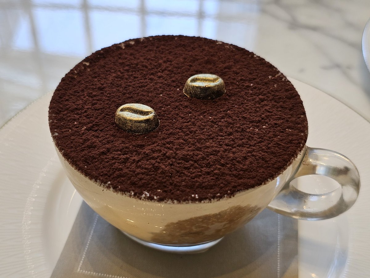 masch3980's tweet photo. Das #Tiramisu, das ich gestern hatte, war einfach köstlich! Jeder Bissen eine perfekte Mischung aus zartem #Espresso, luftigem #Mascarpone und dem süßen Geschmack von Kakao. Ein wahrer #Genuss, den ich sicherlich wieder probieren werde! 😋🍰

#Dubai #Kafffee #SweetIndulgence https://t.co/1M7vpX7dzf