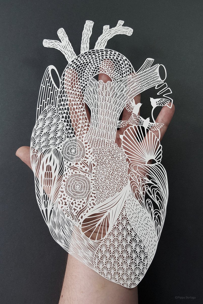 womensart1's tweet photo. Yorkshire-based artist and printmaker Pippa Dyrlaga who creates intricate paper cut artworks #WomensArt https://t.co/2h4HBpjMp4