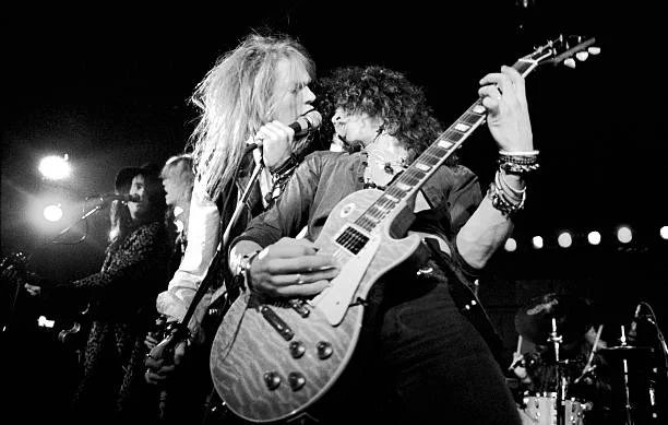 crockpics's tweet photo. Guns N’ Roses performing in Los Angeles, 1985. Photo by Marc S Canter. https://t.co/T13QctNgEd