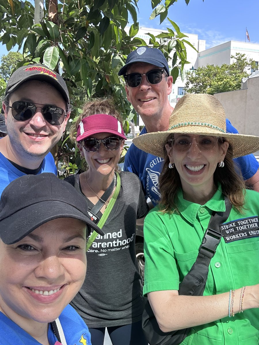 🌟 Hitting the Showrunner Picket with amazing pals! 🎬 Proud member of both WGA and SAG, and their support keeps our spirits up! 💪 #ShowrunnerLife #WGA #SAG #PicketLinePals #StrongerTogether 📸 #HollywoodProtests ❤️