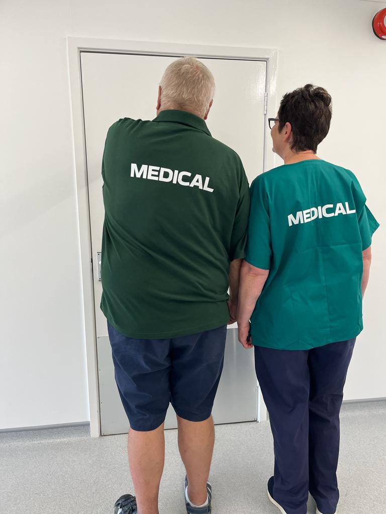 Bronny &amp; Michael modelling the new Medical Team nurse tops this morning :)