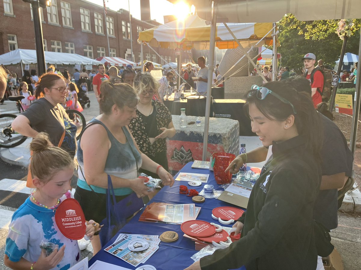patrickecook's tweet photo. What a start for @middlesex_cc &amp; @MiddlesexAlumni at Day One of the @LowellFolkFest #LowellFolkFestival - tons of visitors to our booth at Boardinghouse Park - come on by today for some MCC swag &amp; chat with our students &amp; staff! @PrezPhil @repradymom @DianaDiZoglio @tomtipagolden https://t.co/4B5BroucH5