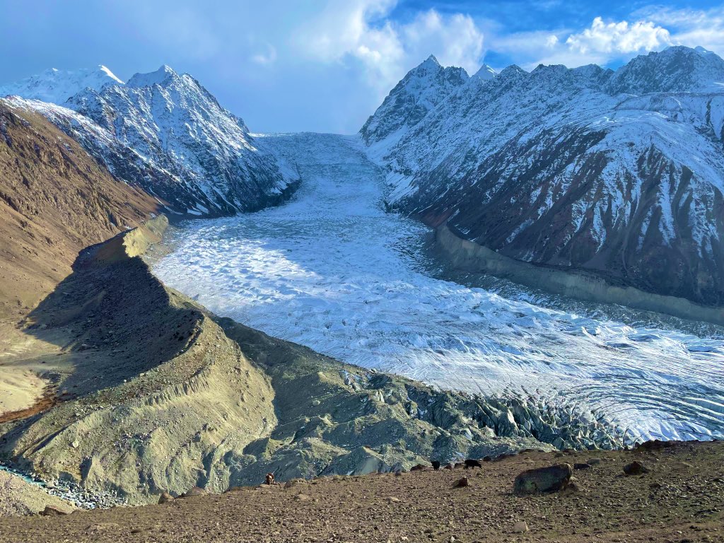 Gadayi_guman's tweet photo. My take on climate crisis in Chitral (some of which I discussed in an online session today): 

- There is not much we can do to mitigate climate change cuz of our vulnerable geography with 545 glaciers hanging on our heads. We are already in the crisis- the melting phase. 
- Climate change for Chitral is structurally unjust! We do not have the capacity to deal with the increasing vulnerabilities that we have never seen before. Many disasters are new disasters for us due to the changing rain patterns and increasing temperatures. We are still processing and trying to make sense but the clock is ticking. 
- We are quite helpless and marginalised in the face of climate emergency. We do not have early warning systems, insurances or any other support to deal with pre and post disaster situations. 
- Climate displacement will only increase with time. We need proper planning for where to move and how to start a new life in new places. 
- Climate anxiety is influencing young people more than anything yet it is still out of discussion for us just like any other mental health issue- mostly cuz we do not have the professional capacity to deal with it. 

Here are a few suggestions: 

- We need to rethink our infrastructure in the light of the disasters we see every year. We need to make bridges, safety walls, roads and houses according to a proper environmental assesment. We have seen so many projects and houses getting washed away due to poor planning. 

- Local wisdom for climate adaptation and nature-based-solutions need to be highlighted and implemented in climate projects. I have seen so many gov and NGO project fail because they brought external “consultant” who are arrogant and do not communicate with the locals. 

- I cannot emphasise enough the need for disaster management set up in every village or at least union council. Floods block all the roads and people do not get any help for days cuz all the offices and NGOs are based in the town areas. The local set up should be run by trained locals who can immidetiely interfere and should also be given the mechanical help to change the routes of water, etc. 

- Chitral produces clean energy. We need subsidised electricity so that people do not cut wood for fuel and architecture. There should be no need to cut old trees instead of planting more trees. 

- Finally, we have to prioritise climate crisis instead of waiting for floods and avalanches every year. We know these events will happen and we have to be proactive. We cannot shut our eyes hoping for things to get better and later get hit by floods. We are in the water and we will have to find ways to swim along. 

Of course there is more, and this is only the start of the discussion. We should continue talking climate change and climate adoptation. 

Picture: Chitiboi glacier in Upper Yarkhoon.