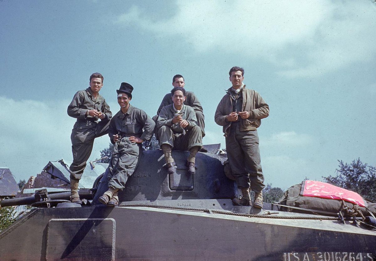 Colour, not colourised, photo of an M4 Sherman tank crew, possibly from 4th Armored Division, at Avranches in Normandy, July 1944. Life Magazine image by Frank Scherschel. #Normandy #WW2