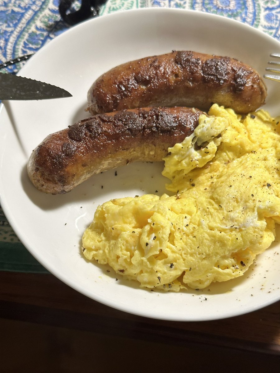 bitfiddler's tweet image. #AllAboutFood  scrambled eggs with Parmesan, and a big sausages. I am stuffed.