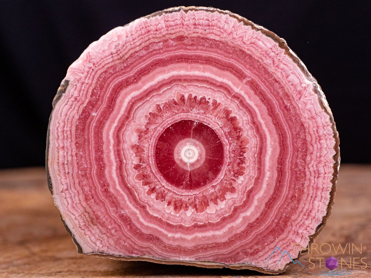 GeologyTime's tweet photo. A slice of natural  Rhodochrosite  Stalactite from Argentina 

📷: Throwin Stones

#minerals https://t.co/IoqexabbLc