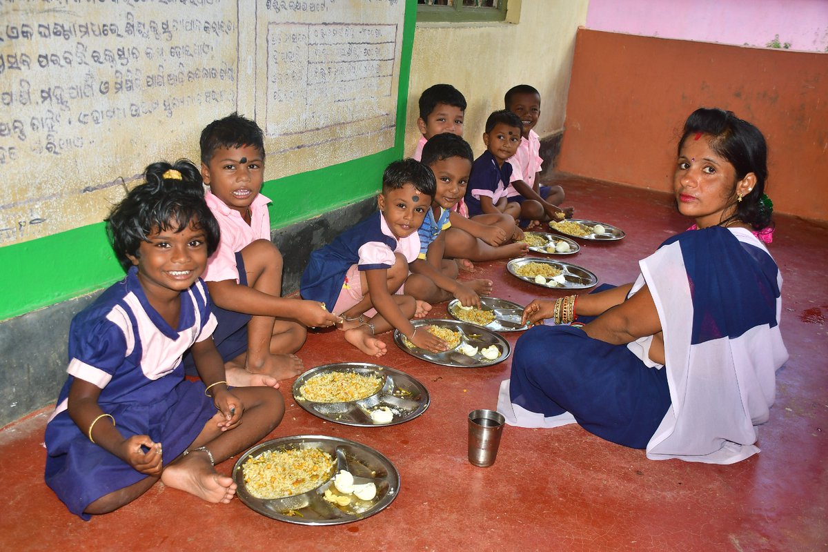'Delighted scenes at the Anganwadi center as small children enjoy their nutritious meal!  Ensuring a healthy start for the little ones is crucial for their growth and development. #Anganwadi #ChildHealth #NutritionForAll