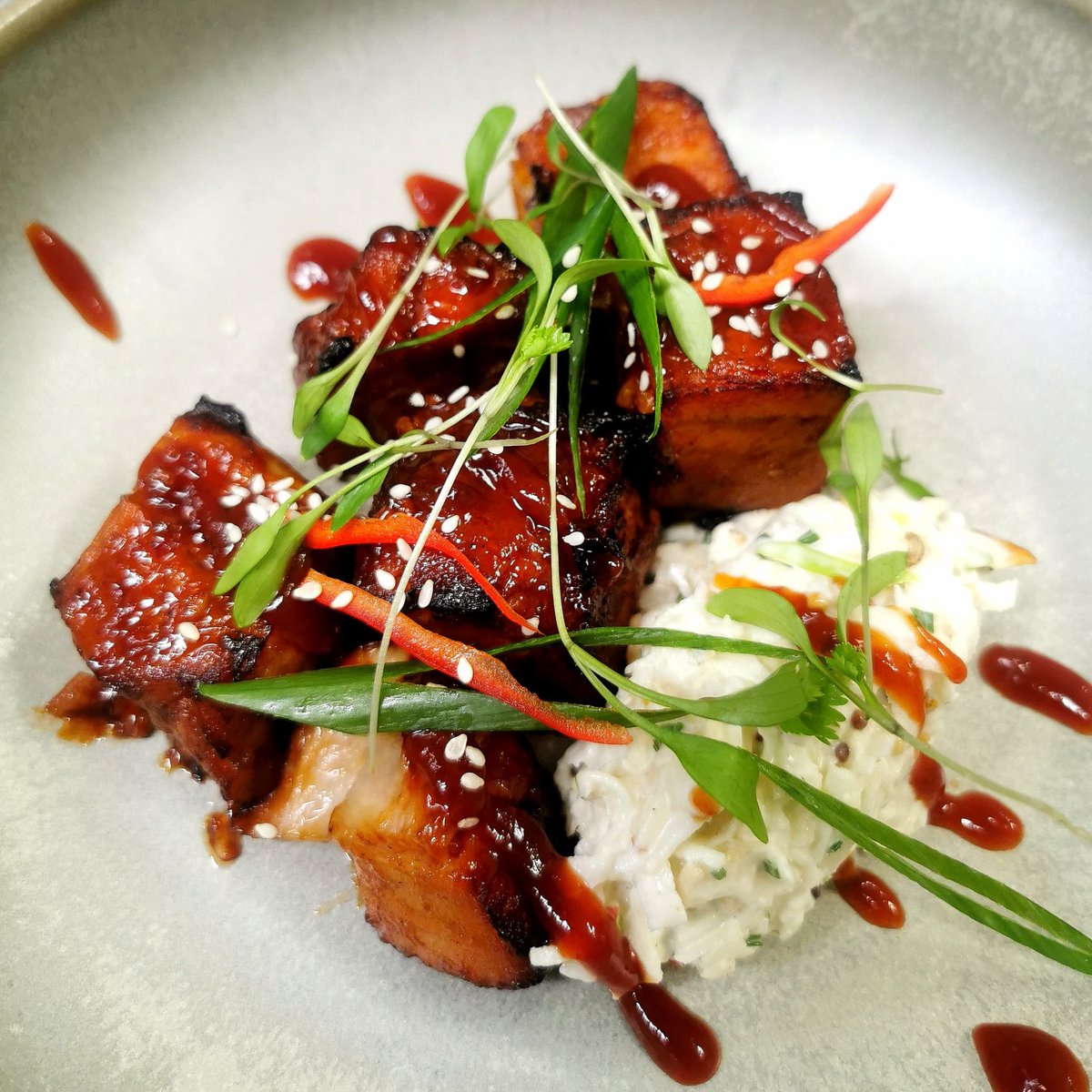 Sticky pork belly bites, apple &amp; celeriac remoulade, sesame seed, spring onoin.
#thesmugglerstable #weekenddinner #starter