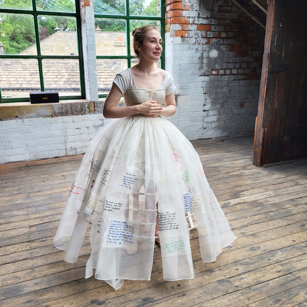 On the blog this week - Fragment of a Dress Performance Piece by @hannahjlamb. Here you see Jenny Skinner modelling Fragment of a Dress once the deconstruction had begun... hippystitch.co.uk/2023/07/hannah… #fragmentofadress #embroidery #textandtextile #textileart #hannahlamb @62Group