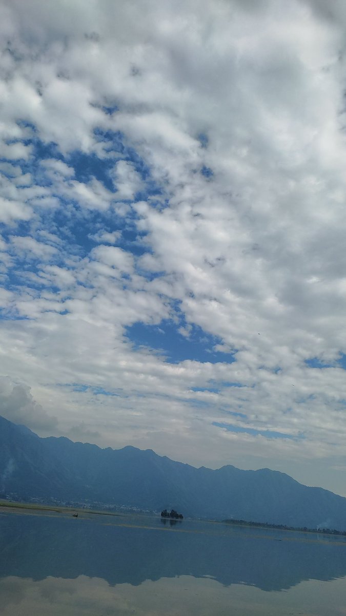 Clouds above, waters below, a picture-perfect scene.