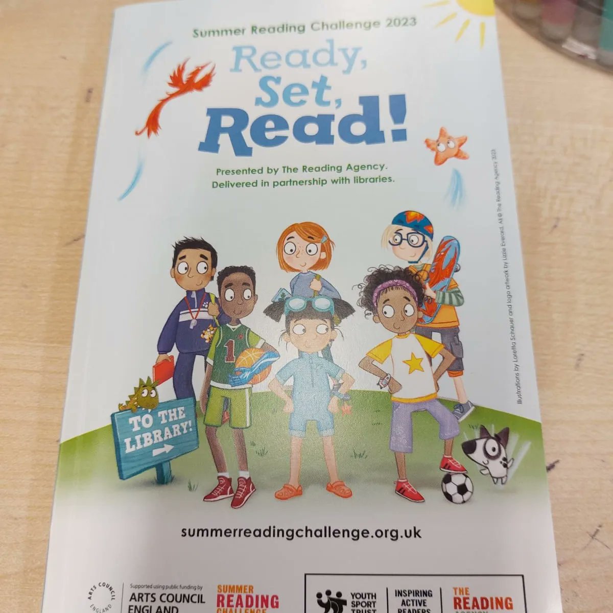 OLWSchool's tweet photo. Don't forget to head to the library to sign up to this years reading challenge! The school with the most children who complete the challenge wins the trophy. Why not tag us in your library selfies so we can display them in sch?  #SummerReadingChallenge #readysteadyread https://t.co/WvLExsPIB2