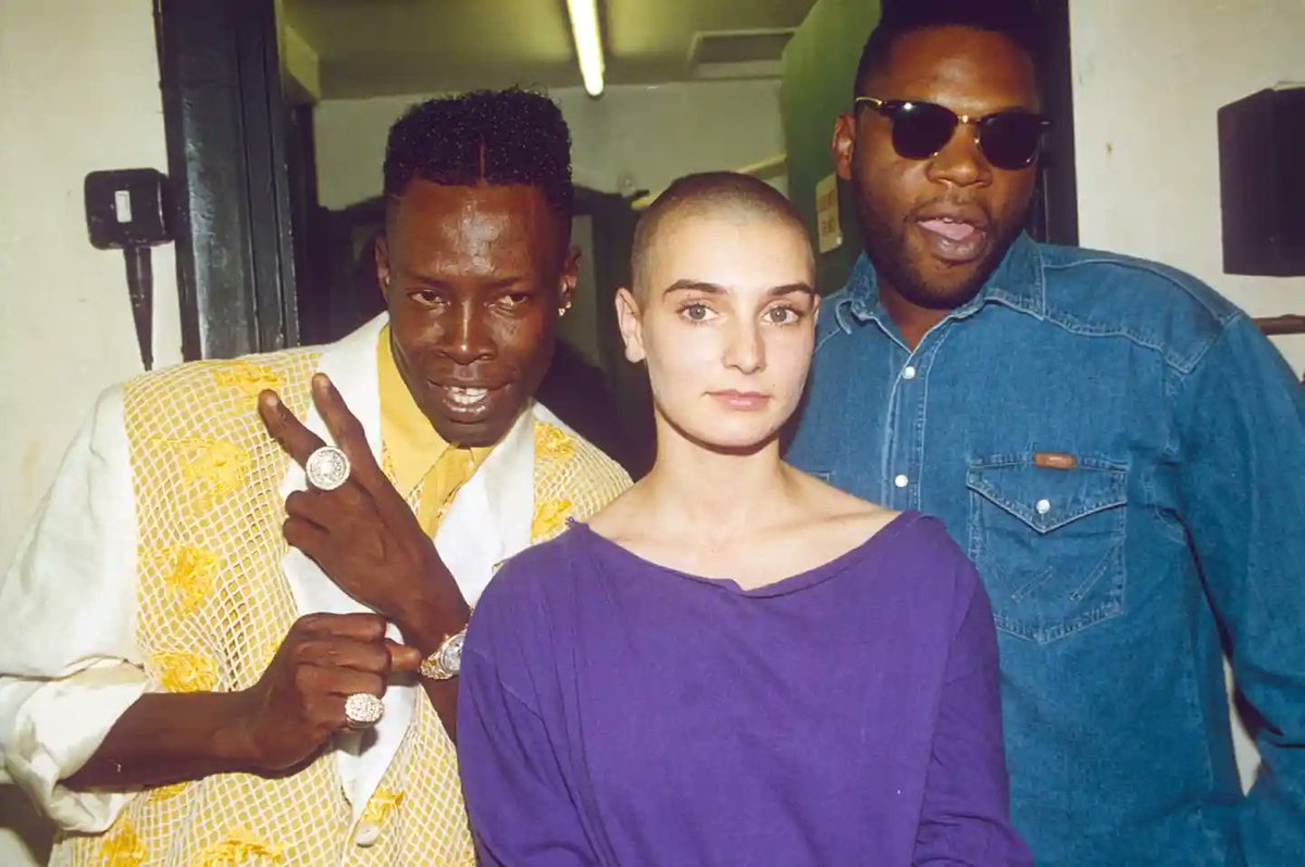 #SineadOConnor rips up a picture of #PopeJohnPaulII on the TV show #SaturdayNightLive 3 October 1992. O’Connor hugs her daughter Roisin during an #antiRacism demonstration in Dublin city centre O’Connor with #ShabbaRanks and Jazzie B of #SoulIISoul in 1991