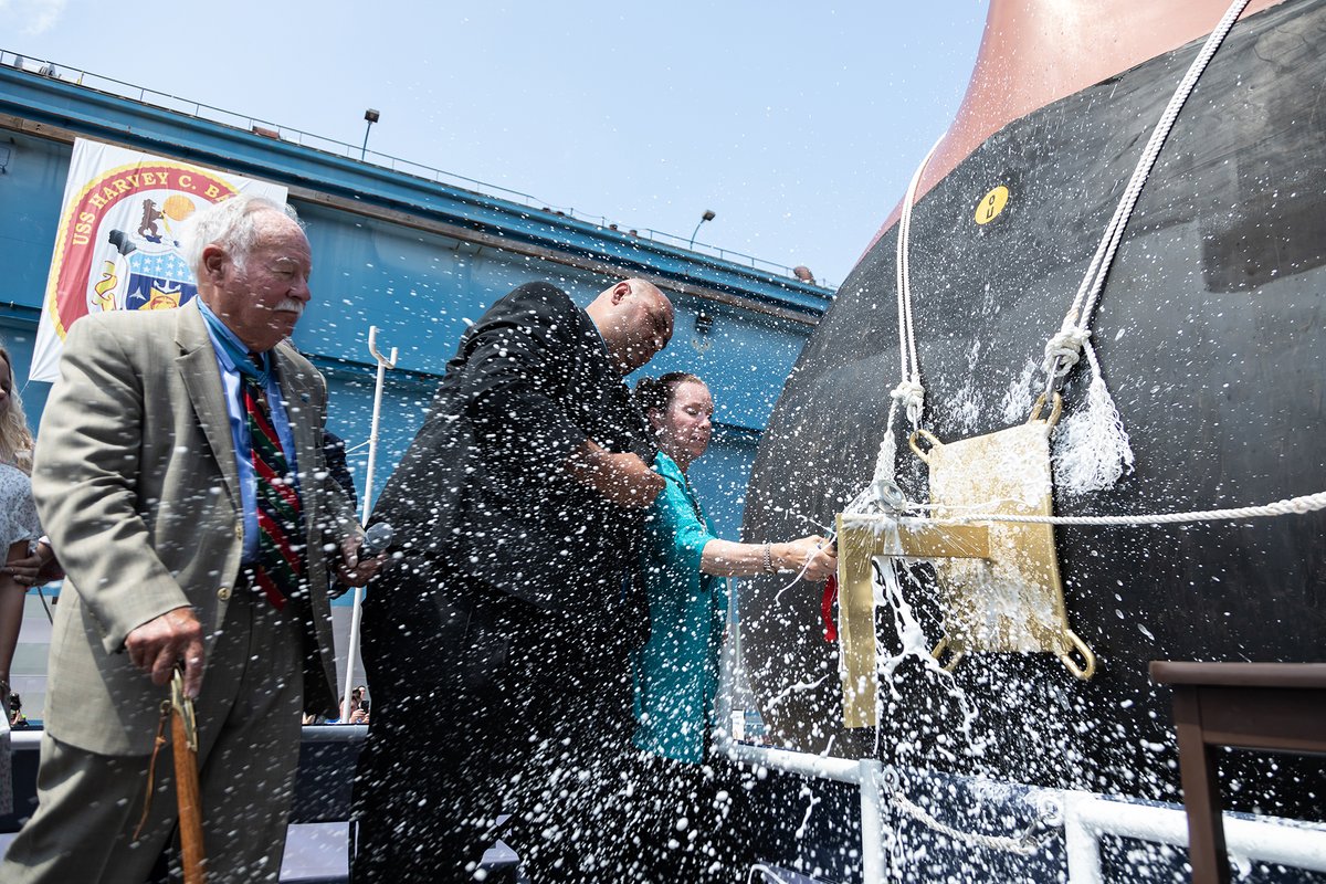 GDBIW's tweet photo. Today the future USS Harvey C. Barnum, Jr. (DDG 124) was christened on our drydock. Attending was the ship’s namesake, Medal of Honor recipient Col. Harvey Barnum, Jr. His wife &amp; ship’s sponsor, Martha Hill, performed the bottle break. We proclaimed the ship’s motto: CHARGE ON! https://t.co/hUq942fVnQ