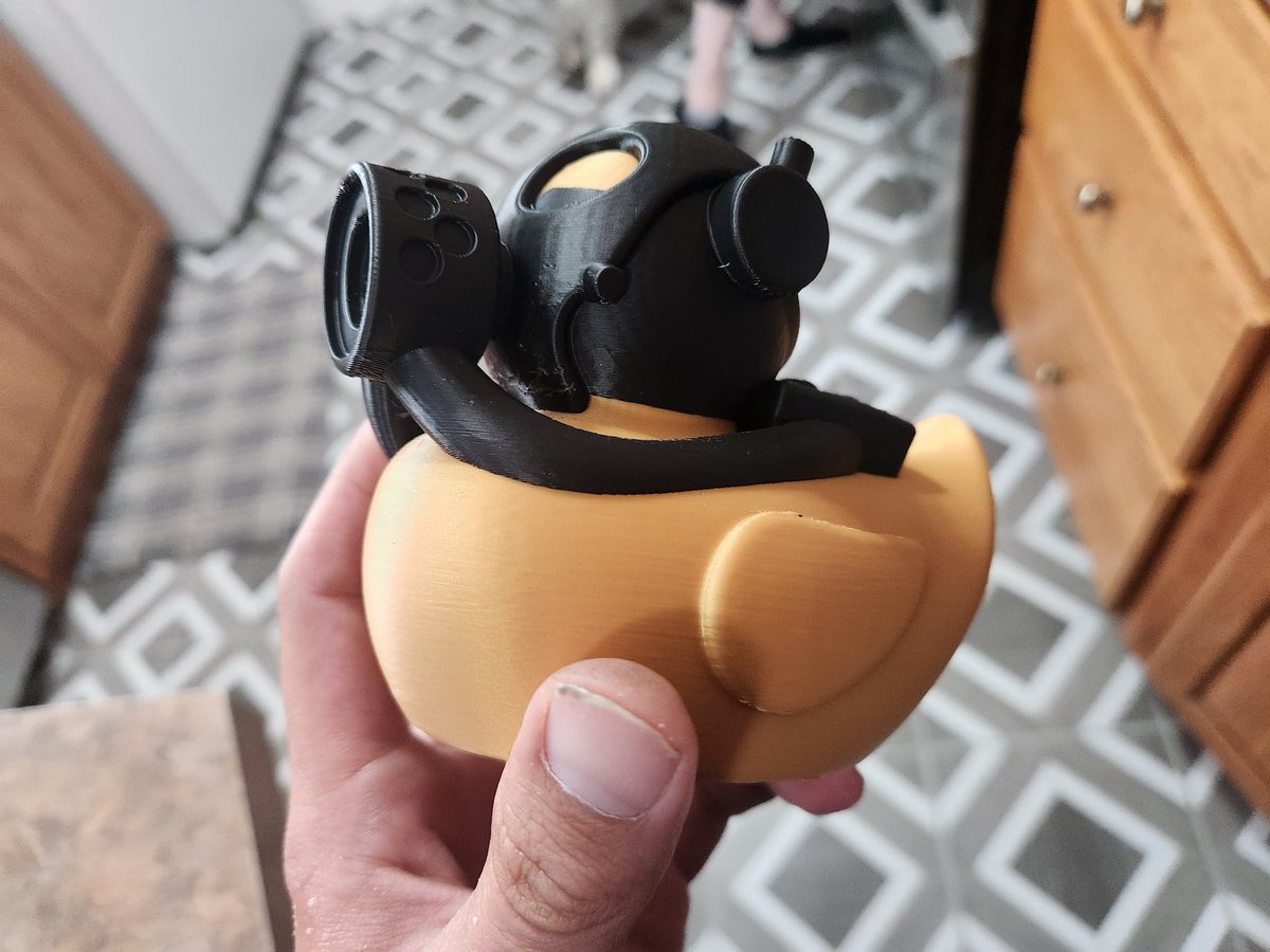 Weird friends = weird requests

A 3D printed rubber duck wearing a gas mask 🦆