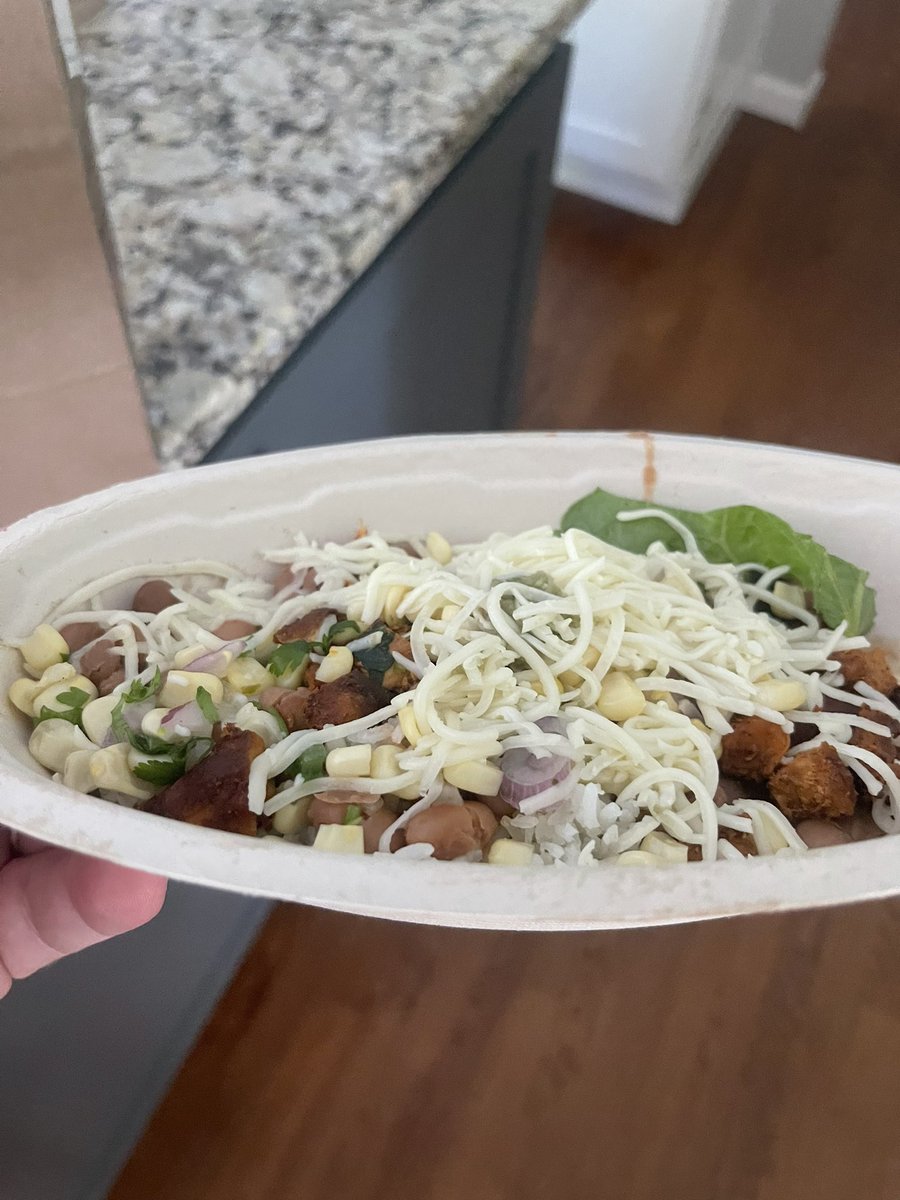 mfranx33's tweet photo. Wow prices go up and portions go down.  I just took this out of the bag, doesn’t even reach top of bottom carton @ChipotleTweets $2 worth of product for $10?  Do better https://t.co/SxDpcJEOr3