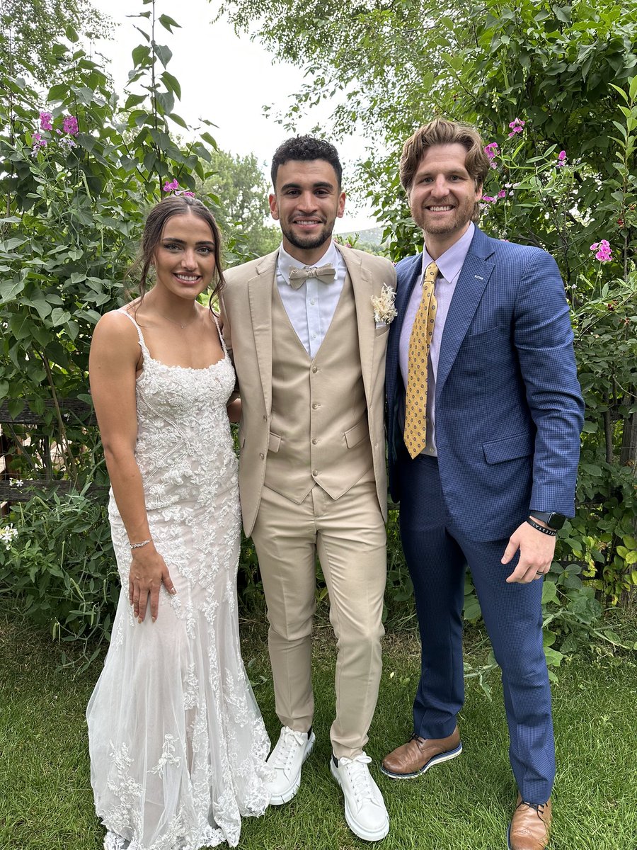 CoachWMartin's tweet photo. One of the greatest blessings in coaching is being a part of the chapters players write after their playing careers. 
ALWAYS BIGGER THAN BASKETBALL!
The beautiful bride and groom!!! 
Love you, PROUD OF YOU 🌊🌊🌊@_JMesmacque https://t.co/khIKTnmRye