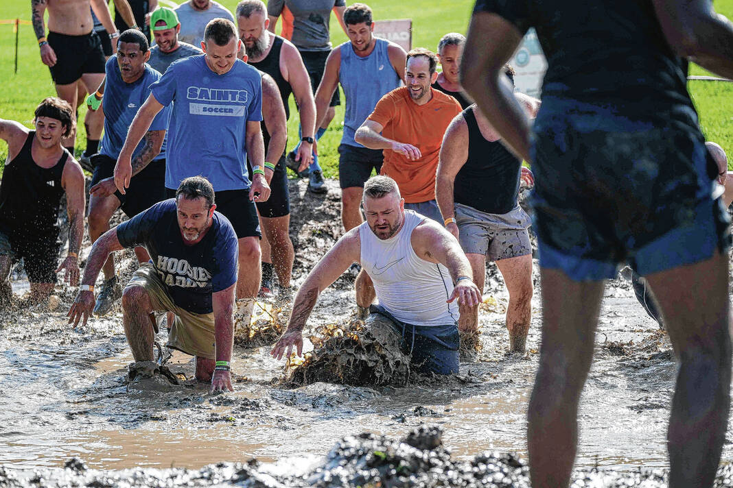 therepublicnews's tweet photo. Multitude Of Mud: Competitors tackle slick course at Tough Mudder https://t.co/hdpur2YWf8 https://t.co/A4FpSsm6Vq