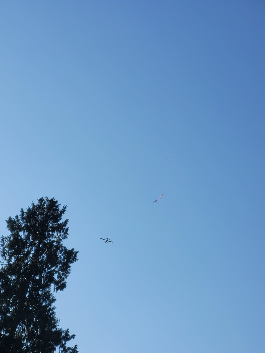 vancityerik's tweet photo. Someone flying a banner for the Q-Anon movie in Canada lmao what https://t.co/4DSq80UPRr