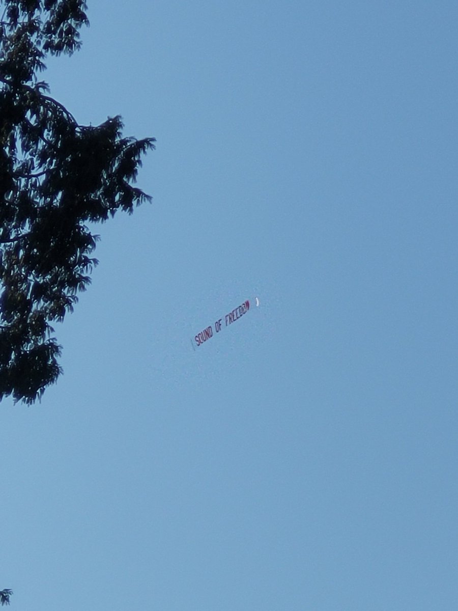 vancityerik's tweet photo. Someone flying a banner for the Q-Anon movie in Canada lmao what https://t.co/4DSq80UPRr