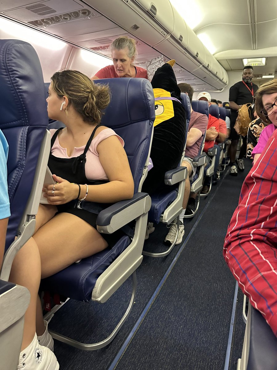 On a <a href="/SouthwestAir/">Southwest Airlines</a> flight, the flight attendants had to do several recounts before takeoff. This banana pillow was originally in a middle seat and they thought it was a lap-child which threw the count off.  I love this airline!