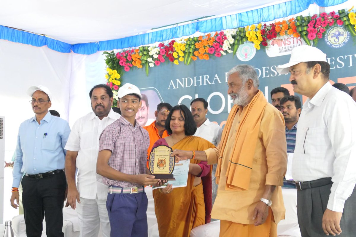 On the eve of Global Tiger Day, 2023 Flagged off the Electric scooters and distributed awards to the students participated in various competitions and meritorious certificates to the staff at S V Zoo Park, Tirupati by Dr.Peddireddi Ramchandra Reddy, Hon'ble Minister for EFS&T.