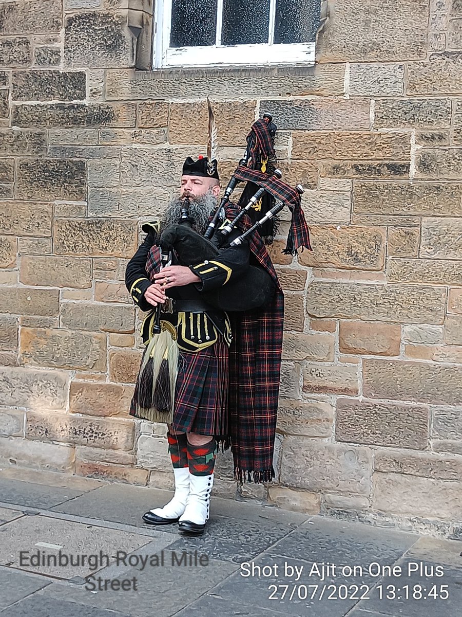 The Typical Scottish Bagpiper. You can easily sight it on the Famous Royal Mile Street of Edinburgh on the way to The Iconic Edinburgh Castle.

Throwback July 2022
During my visit to Scotland.
#Edinburghcastle
#SCOTLAND 
#scottishbagpiper