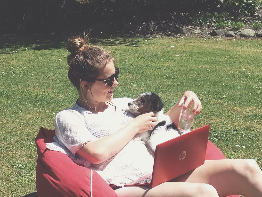 Gabi Rennie teaching her dog how to stream World Cup matches