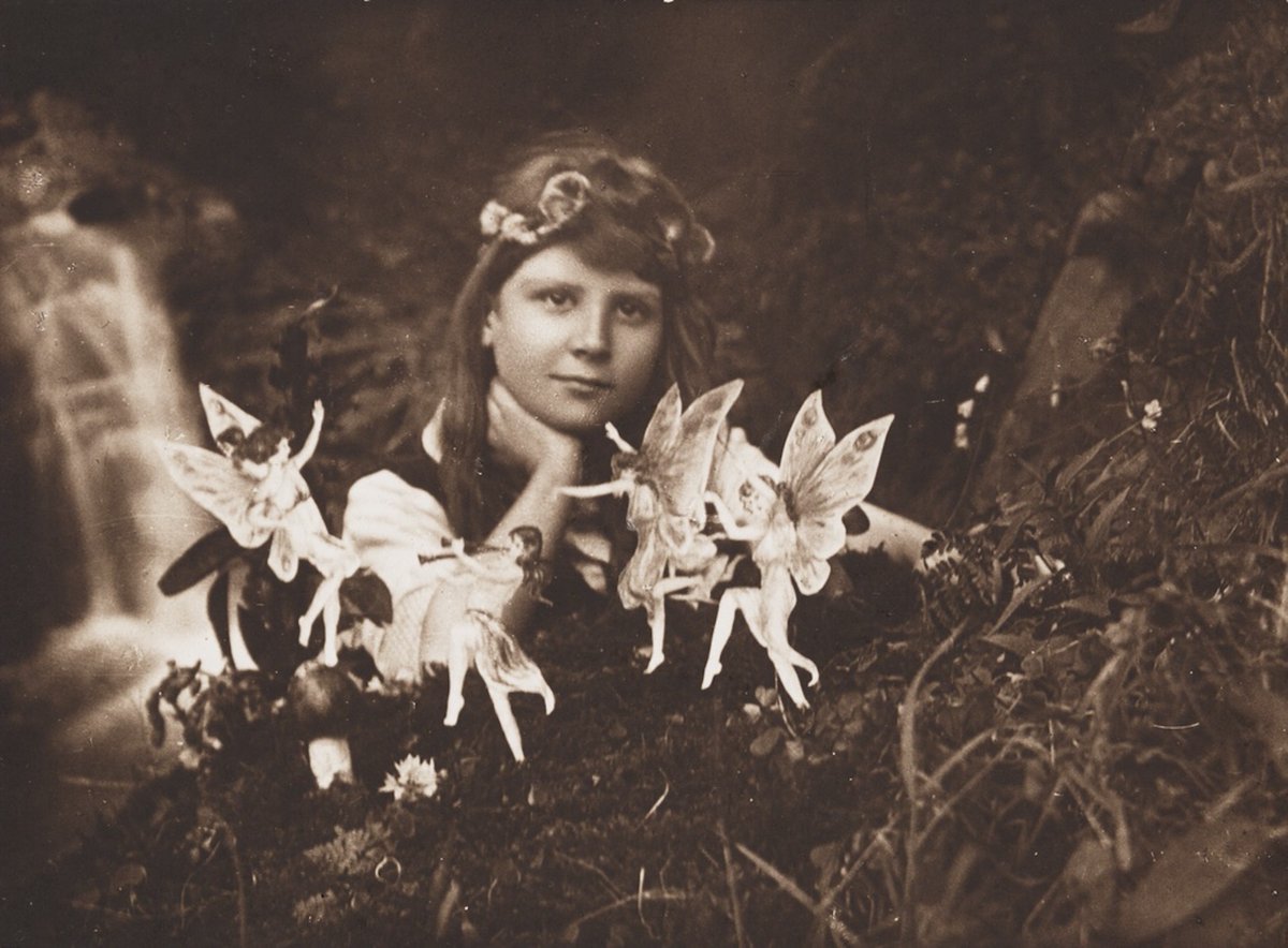 Alice and the Fairies, by & © Elsie Wright & Frances Griffiths, July 1917
Photograph
(Science Museum Group collection)
This photograph was accepted, by some, as proof of the existence of fairies. 
Later one admitted they had created it.
#CottingleyFairies