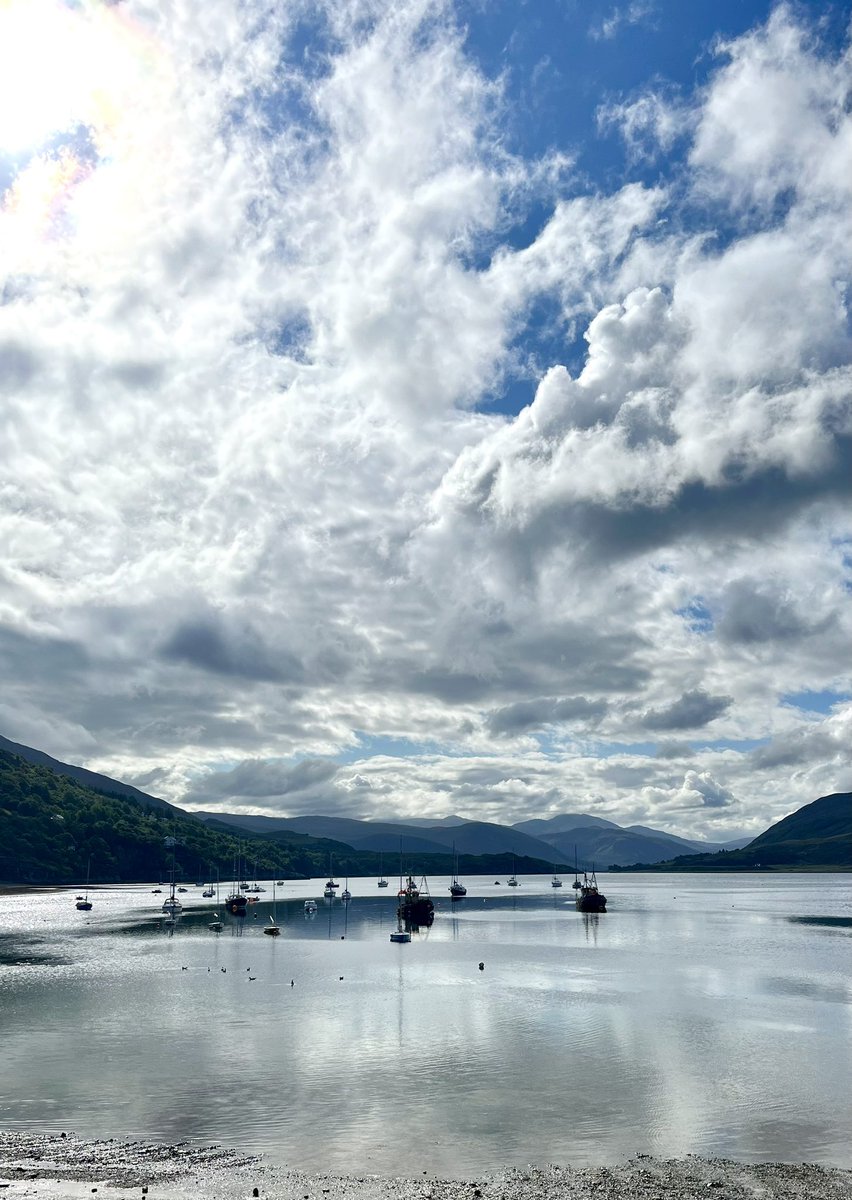 HI_Voices's tweet photo. Loch Broom sparkling in the sunshine. I’ve included a little video panorama of Ullapool. The seafront pavement and cycle lane improvements have been completed since we were here last year and it looks excellent. Lots of people sitting out enjoying fish and chips last weekend. https://t.co/aG23IvjbRR