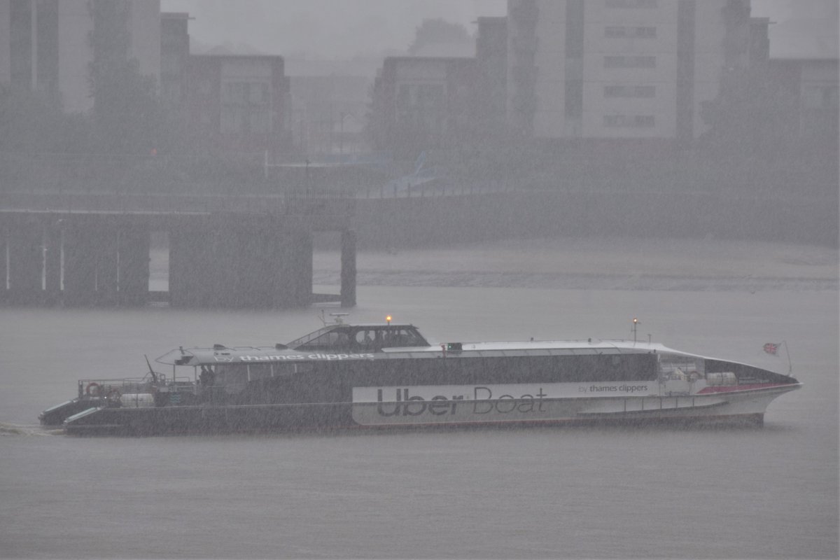 AJBC_1's tweet photo. The aptly named MONSOON CLIPPER - running the inbound #RiverBus service along the #Thames in the heavy rain this afternoon.
#UberBoat #ThamesClipper #London
#dlr_blog https://t.co/l31UNlFoVy