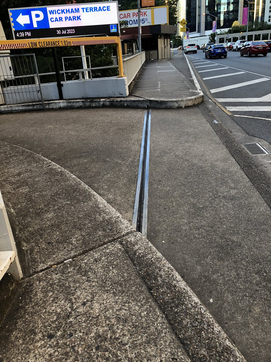 WendyAghdam's tweet photo. Hey @brisbanecityqld 😊 
Have been wondering why this path on Turbot St leads to inaccessible curbs.
Can this be reviewed please?
Second google street view image of the carpark exit may be a good place for a wombat crossing. https://t.co/fYEveRTNdc
