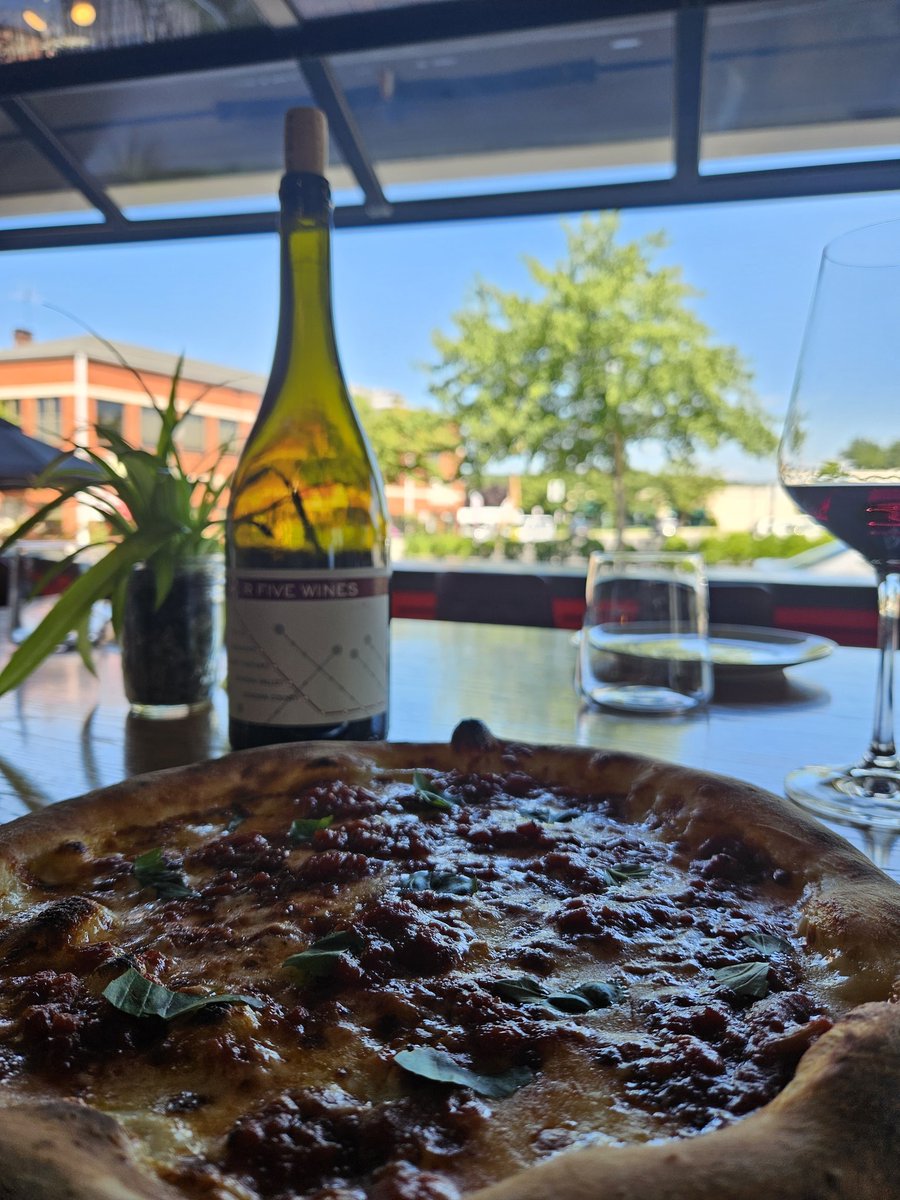 POV OF YOU at R5 eating pizza and drinking wine.