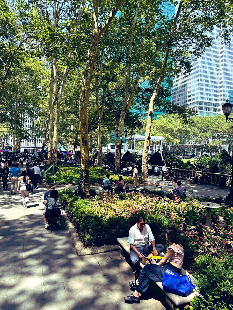 '☀️NYC vibes☀️ Soaking up the sun in Bryant Park, surrounded by the beautiful city skyline and good company. #SummerInNYC #BryantPark #SunshineSerenade 🏙️🌞👭'