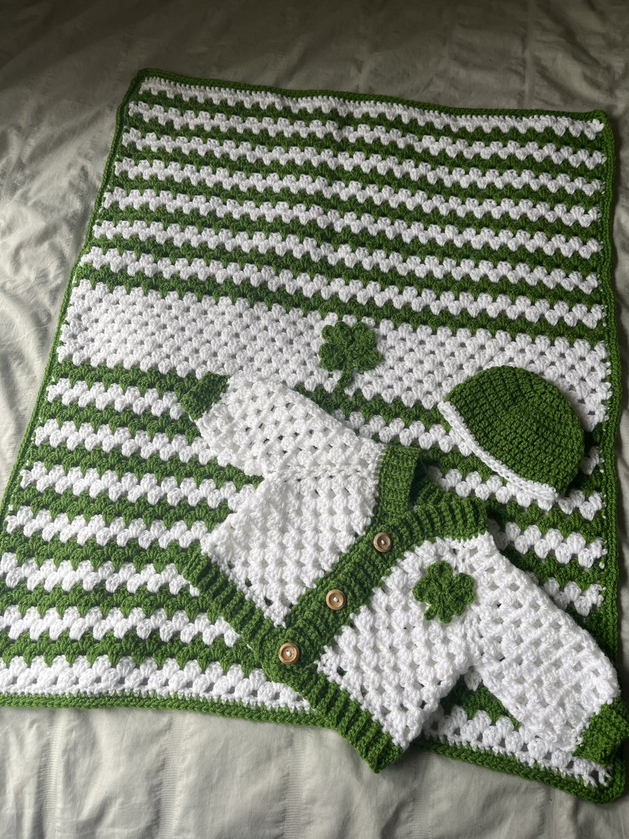 LeanneDaniel's tweet photo. I’ve been working hard to create this super cute Celtic themed baby gift set 🍀 for £42, it includes a pram blanket, cardigan and hat, in 0-3 months size. (I can do bigger too 💚) I would appreciate if you could all retweet this for me 🥰 https://t.co/pDOZk7qXEr