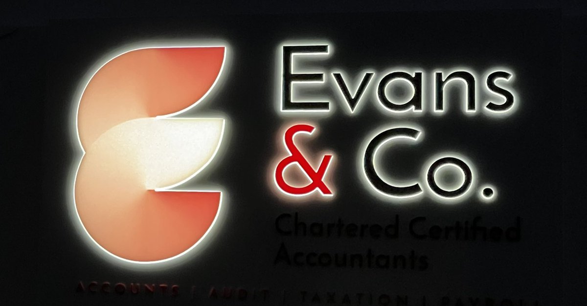 The night view of our new signage on the exterior of our office on Chanterlands Avenue!