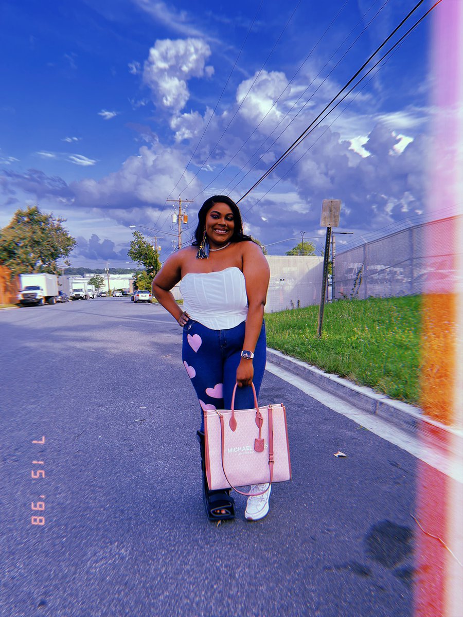 thee_different1's tweet photo. The purse, boot, and clouds are all paid actors 💕💁🏽‍♀️ https://t.co/MyGROBSJm7