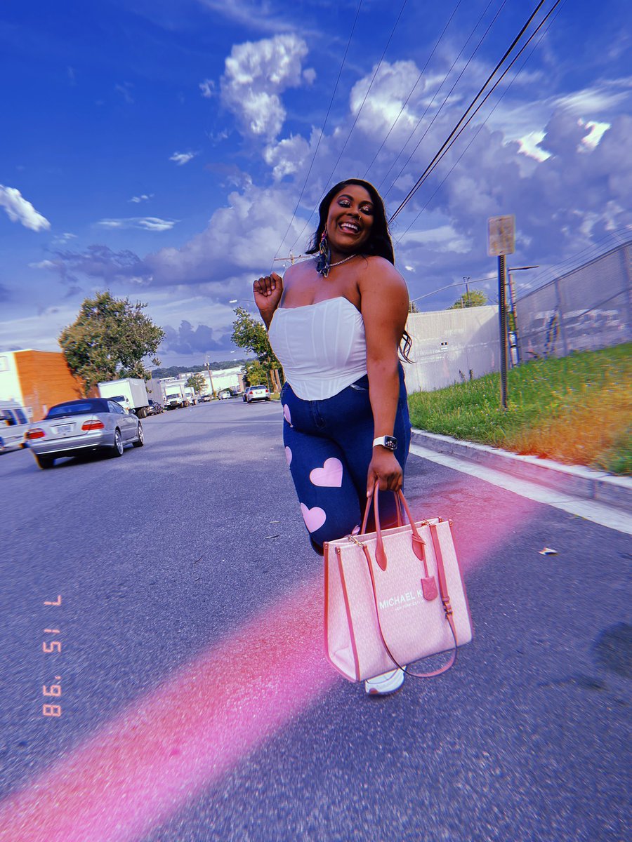 thee_different1's tweet photo. The purse, boot, and clouds are all paid actors 💕💁🏽‍♀️ https://t.co/MyGROBSJm7