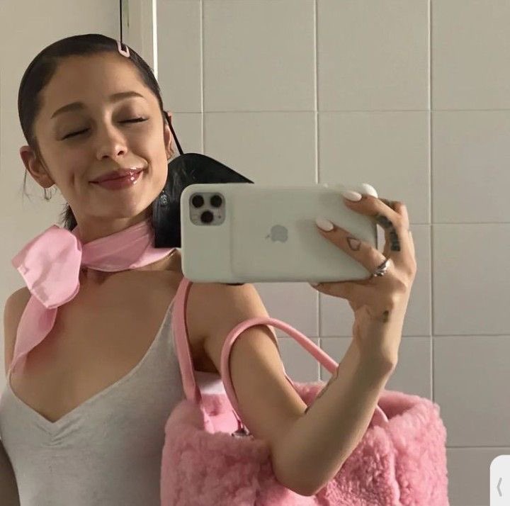 arianasfe's tweet photo. wicked  ari  in  pink  🎀 https://t.co/pOzUyMVoah
