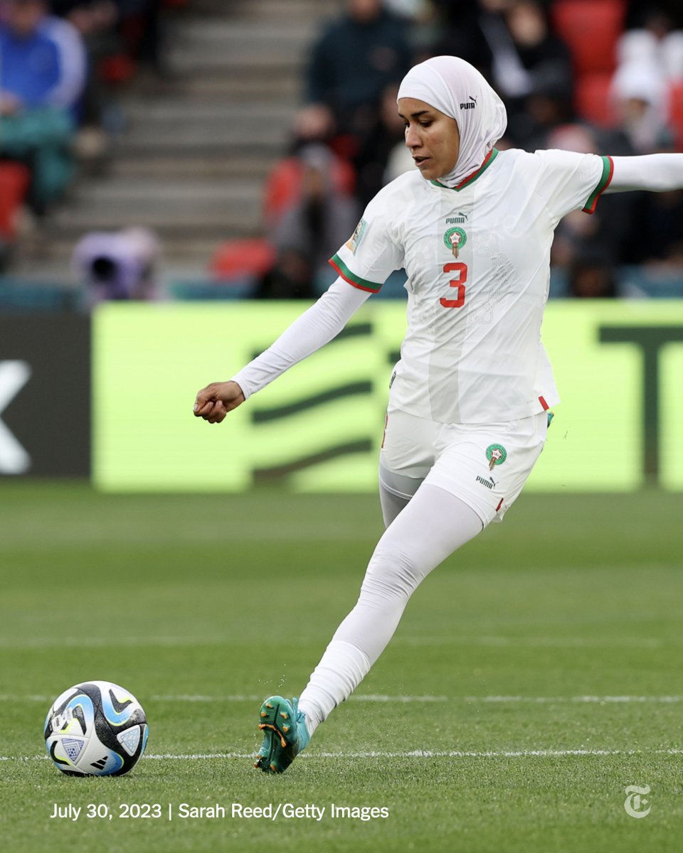 nytimes's tweet photo. Nouhaila Benzina, a 25-year-old defender for a pioneering Morocco team appearing in its first World Cup, became the first player to wear a hijab in the tournament when she started her team’s 1-0 victory against South Korea on Sunday. https://t.co/dfnJHHLhKo https://t.co/xS3dLeV1vA