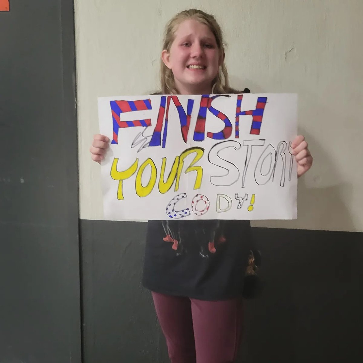 SClarkGermany's tweet photo. @CodyRhodes #BecomingCodyRhodes  - No question, just the biggest thank you for making my mommy heart extremely happy! My daughter had made a sign for you in Norfolk. You were about to leave when you saw it, came back just for her, and signed it! Happy tears for this little girl! https://t.co/gqS2dlRtcK