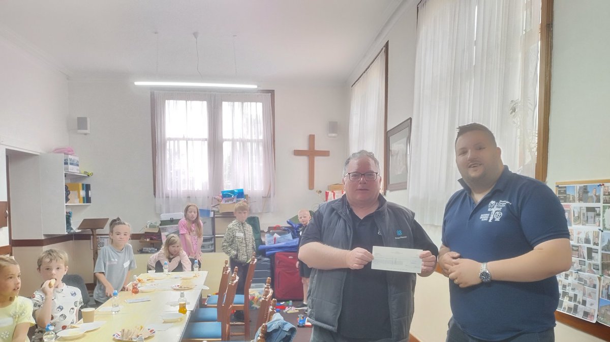 Happy to hand over a Co-op cheque to support EU Congregational Church Shotts Summer Event.