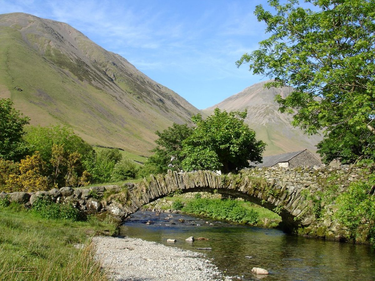 Old stone walking bridge. Lake District. England. NMP.