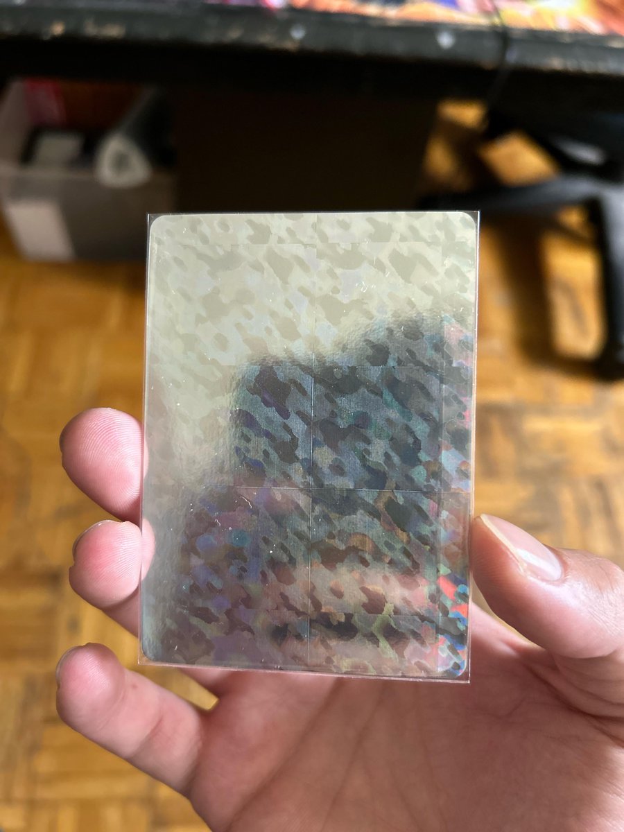breadedpluto's tweet photo. @KaijuNo69 @dbs_cardgame It’s part of the foiling pattern not an actual print line. https://t.co/nBbPLE2dkl